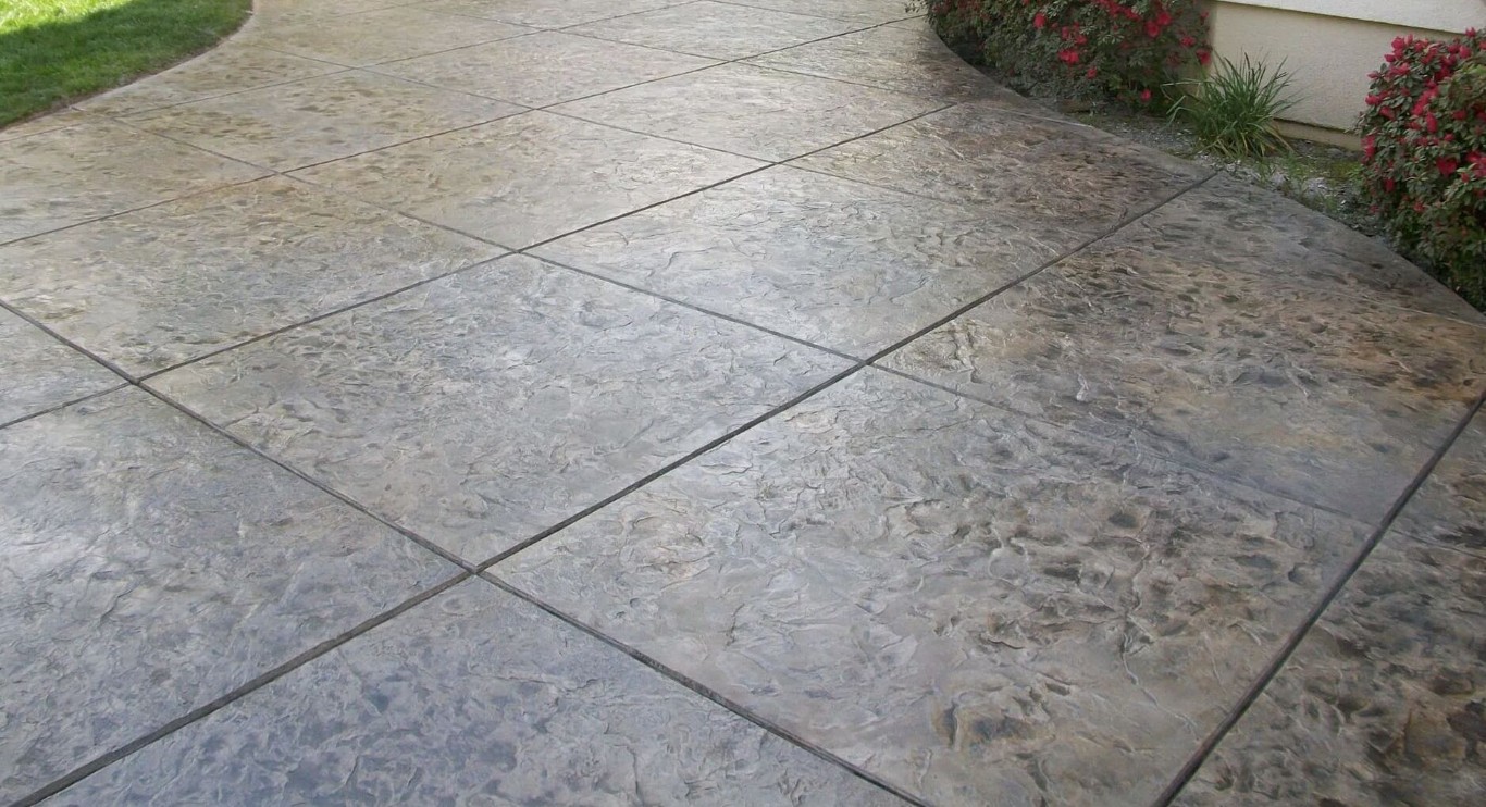 Decorative concrete driveway with tile pattern
